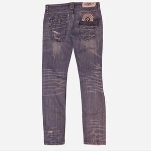 Taverniti "Courtney" Jeans with a Low-rise, Slim-fit, and a Tapered Ankle